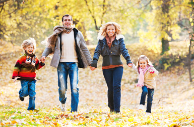 family cycling in fall
